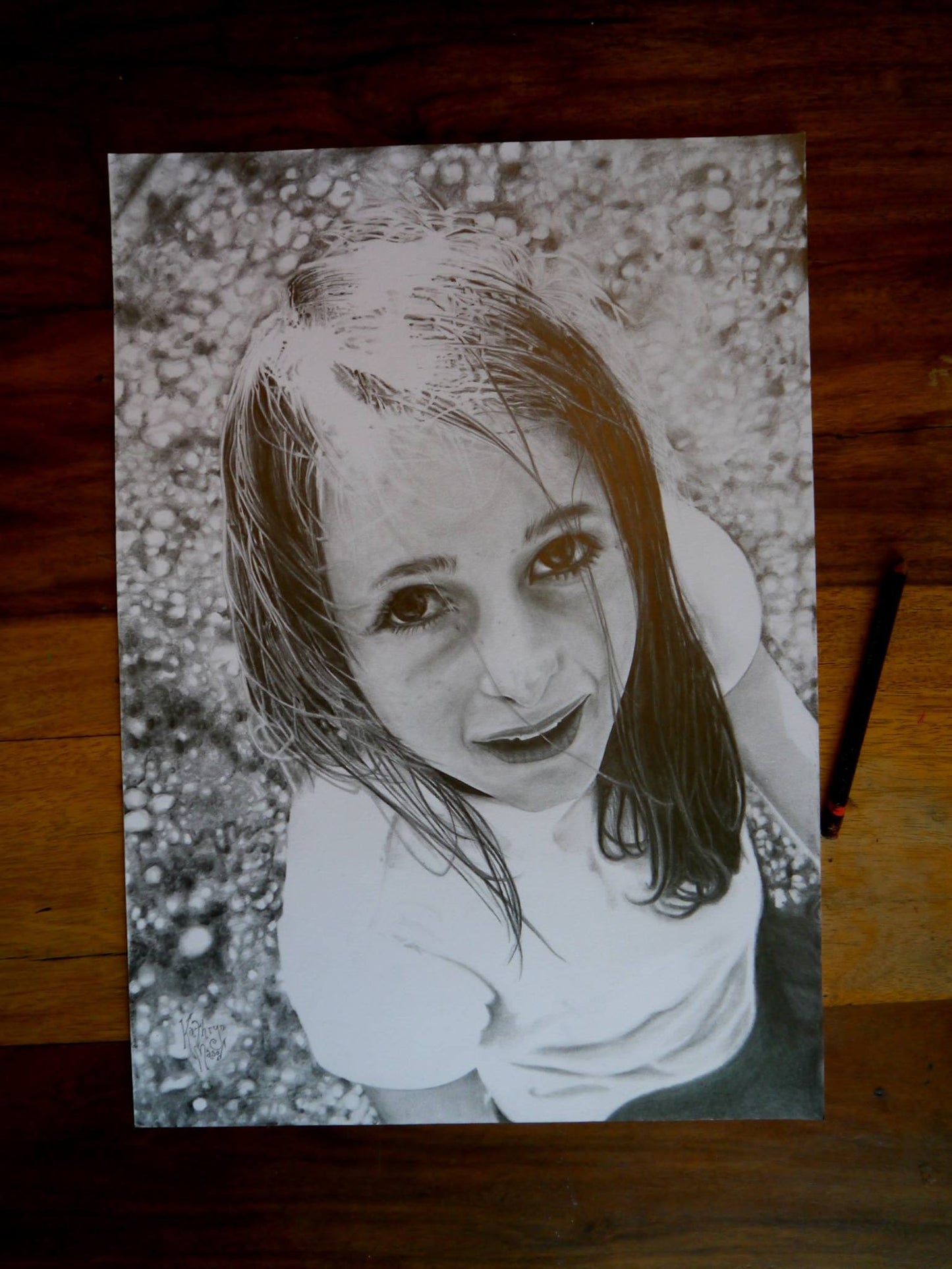Photo of child pencil portrait drawing commission