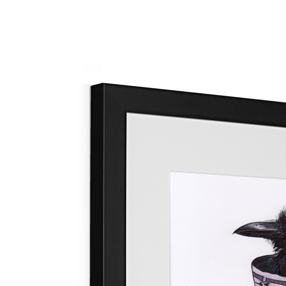 Photo showing corner edge view of 'Sheltering from a Storm in a Teacup' Cute Baby Crow Gothic Fine Art Print from artist Kathryn Mason's original drawing. Framed and Mounted. Shown here with black frame.