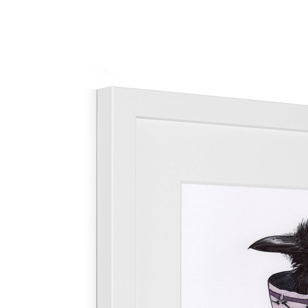 Photo showing corner edge view of 'Sheltering from a Storm in a Teacup' Cute Baby Crow Gothic Fine Art Print from artist Kathryn Mason's original drawing. Framed and Mounted. Shown here with white frame.