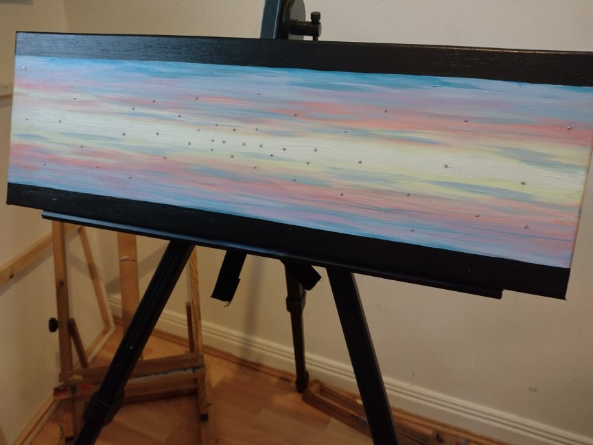 Front view photo of 'Heavenly Sky' Original acrylic on canvas painting by Kathryn Mason. Embellished with Swarovski crystals  in abstract style with pastel mid and black top and bottom stripes. 