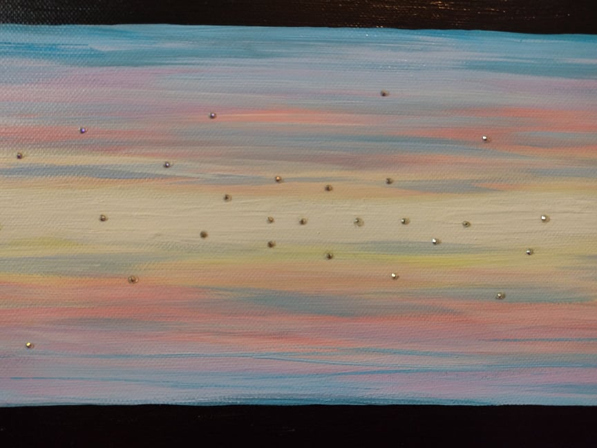 Close-up view photo of 'Heavenly Sky' Original acrylic on canvas painting by Kathryn Mason. Embellished with Swarovski crystals  in abstract style with pastel mid and black top and bottom stripes. 